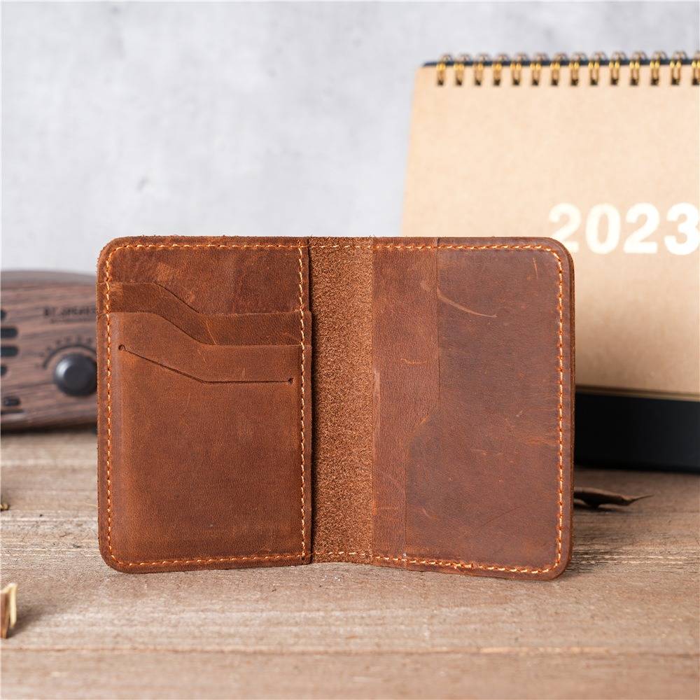 Brown men's bifold wallet, flat lay