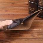 Dark brown men's wallet, stitching detail