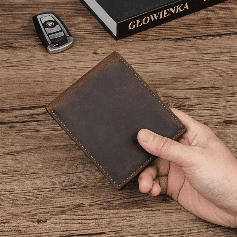 Dark brown men's wallet, flat lay
