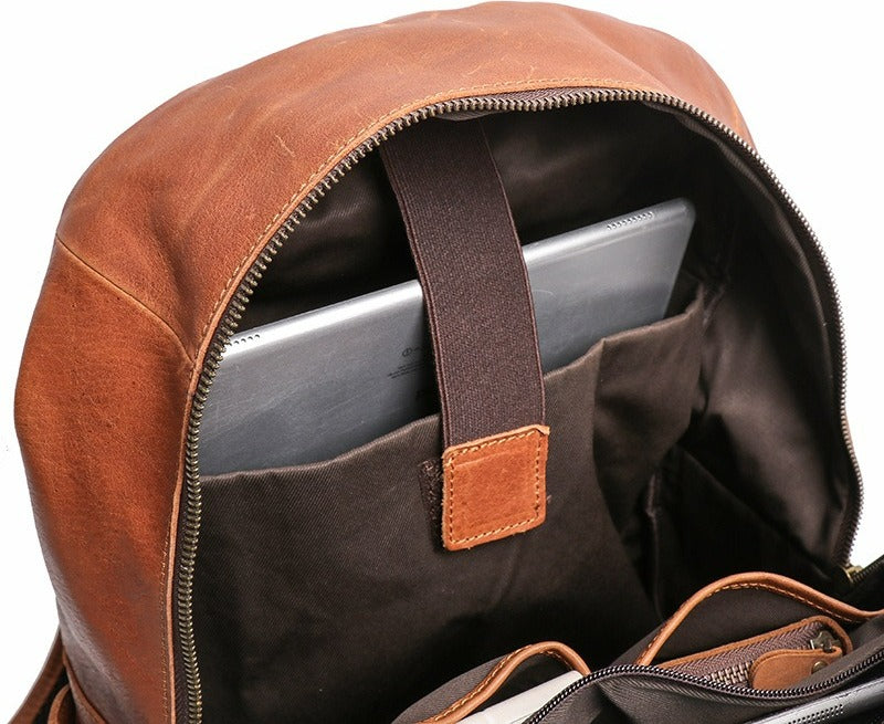 Brown leather bookbag, back view