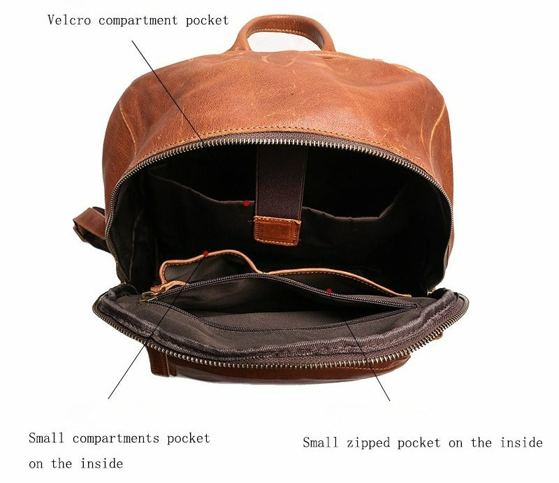 Brown leather bookbag, handle detail