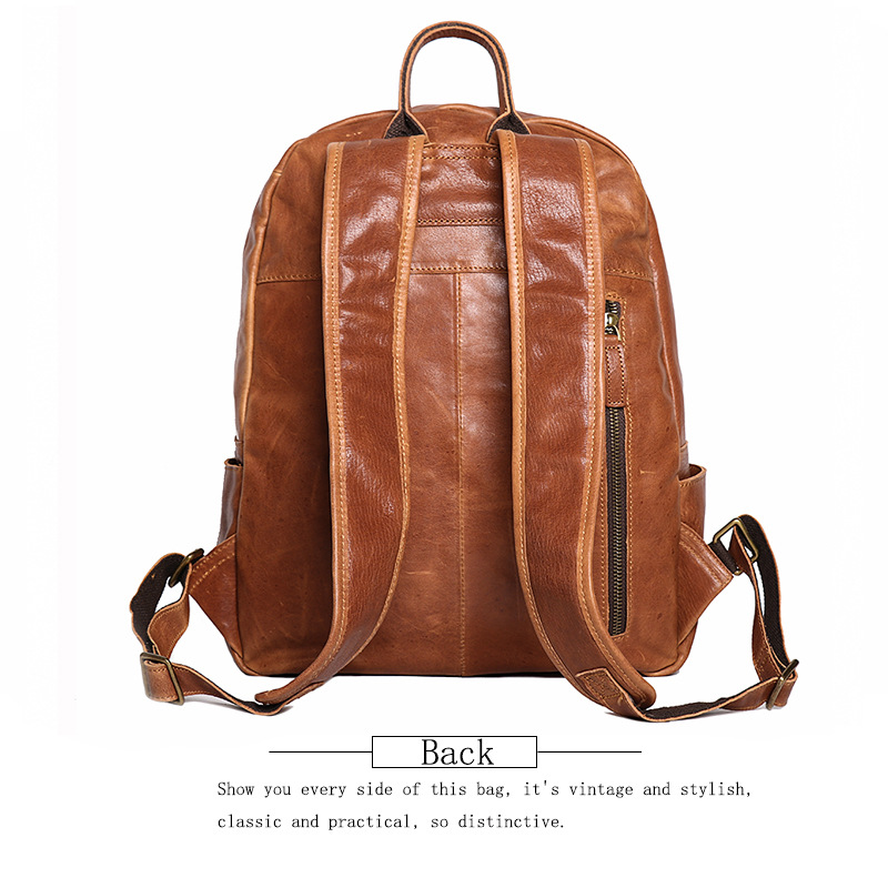 Brown leather bookbag, side pocket detail
