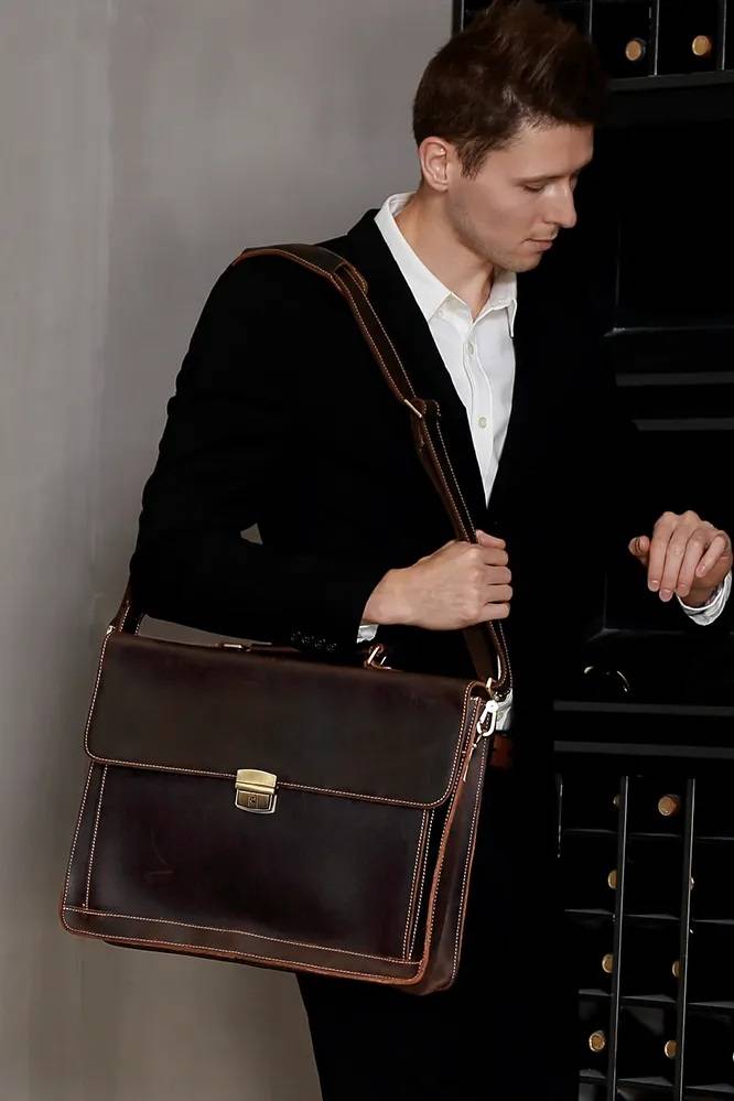 Dark brown men's briefcase, flat lay