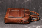 Brown men's briefcase, hardware detail