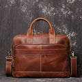 Brown men's briefcase, handle detail