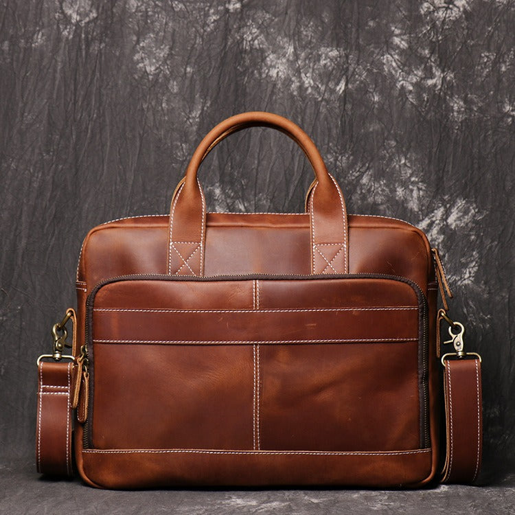 Brown men's briefcase, handle detail