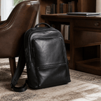 Black leather business backpack in a European travel scene