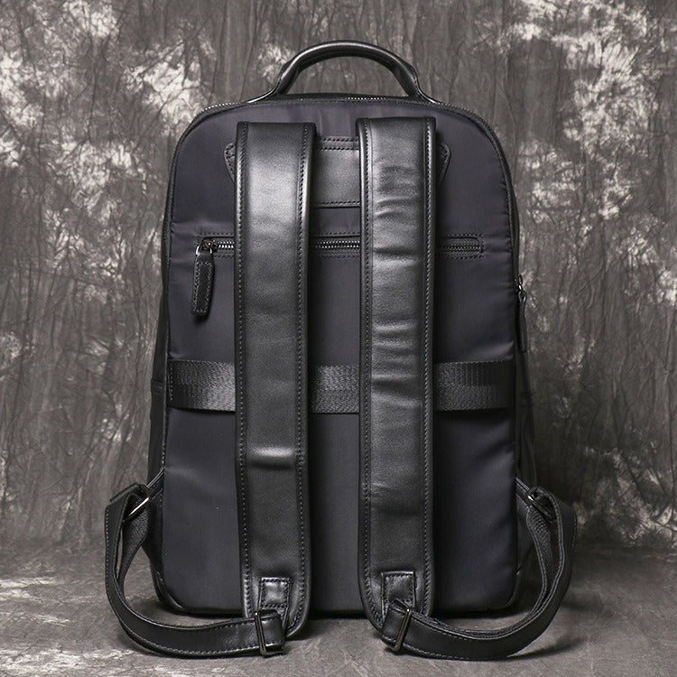 Black men's business backpack, back panel detail