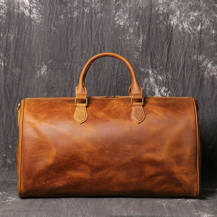Brown men's carry-on bag, side view