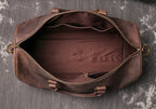 Dark brown men's carry-on bag, strap detail