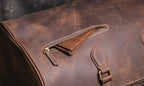Dark brown men's carry-on bag, side view