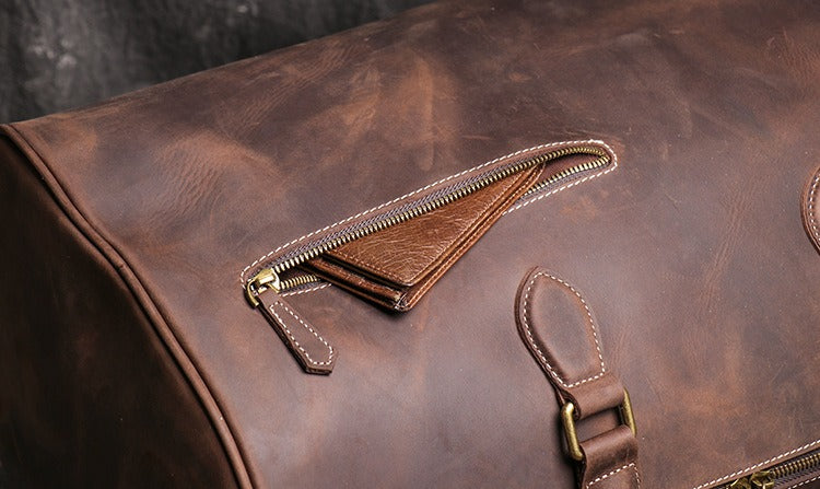 Dark brown men's carry-on bag, side view