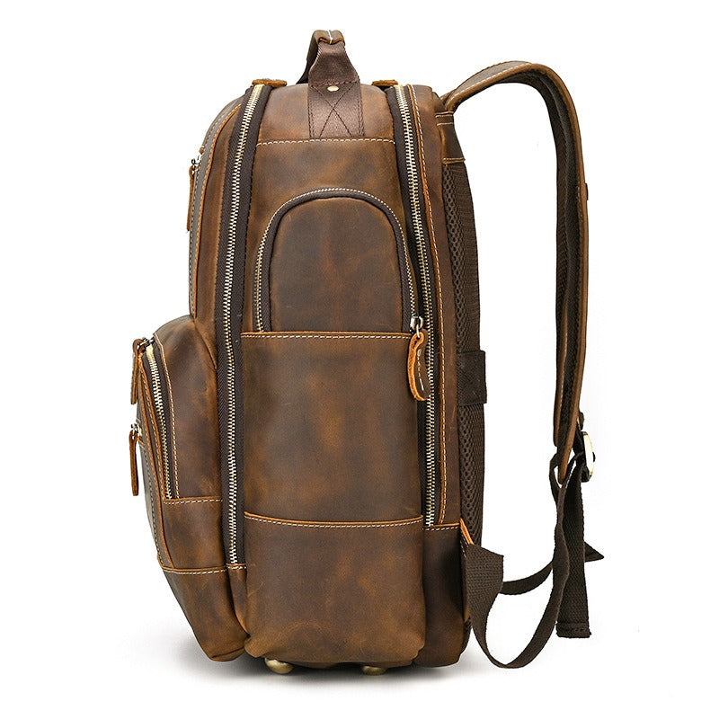 Brown men's college backpack, front pocket detail