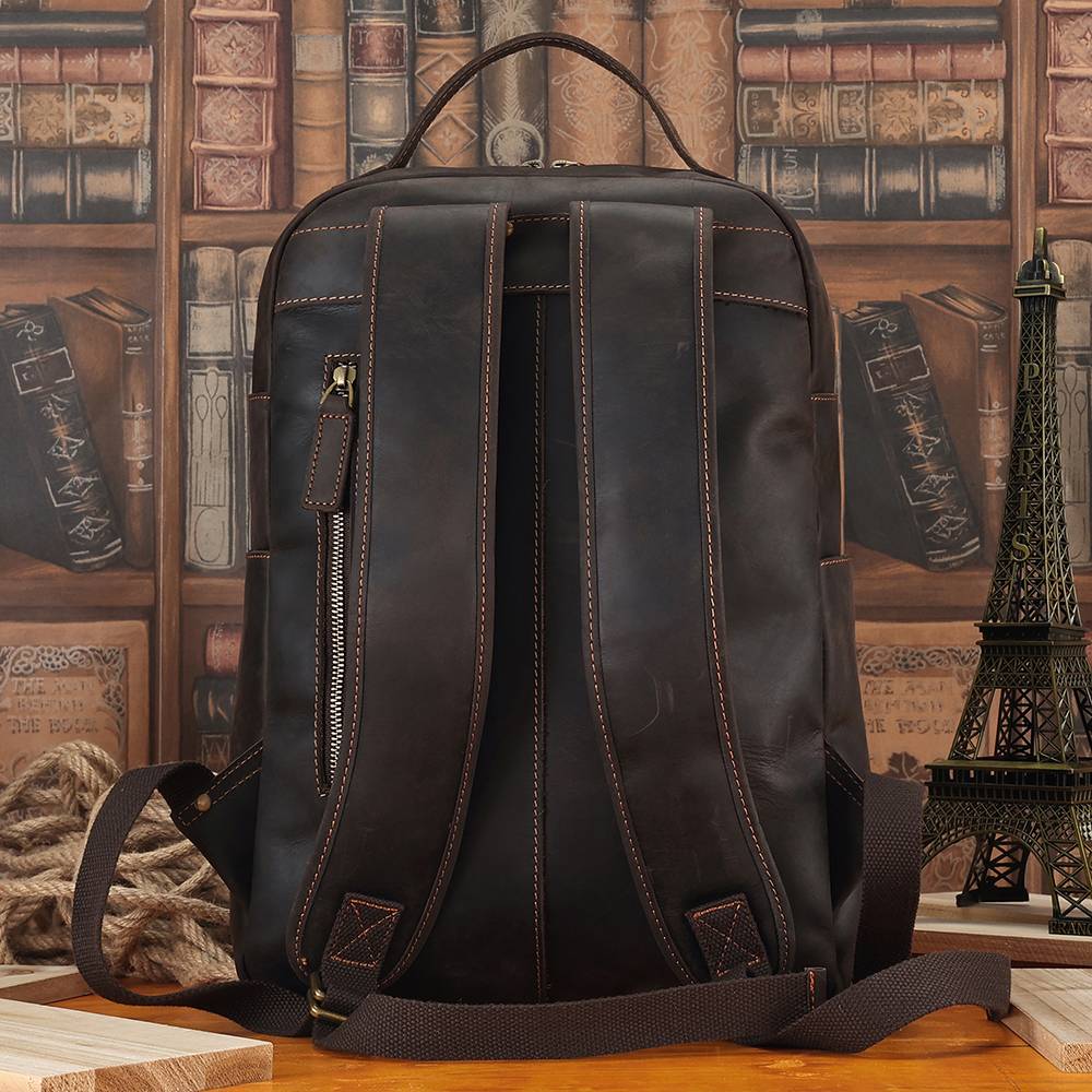 Leather commuter backpack, handle detail
