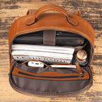 Brown men's computer backpack, handle detail