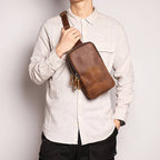 Brown men's crossbody bag, back view