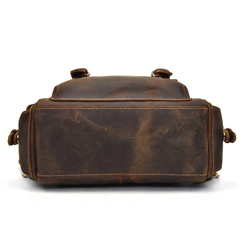 Dark brown men's daypack, flat lay