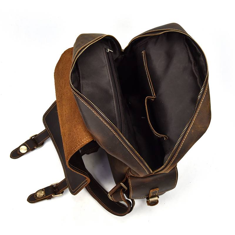 Dark brown men's daypack, laptop compartment detail