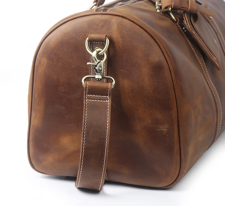 Vintage brown men's duffle bag, side view