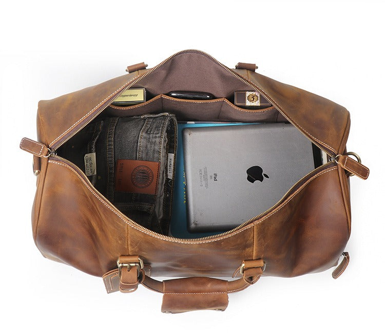 Vintage brown men's duffle bag, handle detail