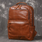 Brown men's laptop backpack, strap detail