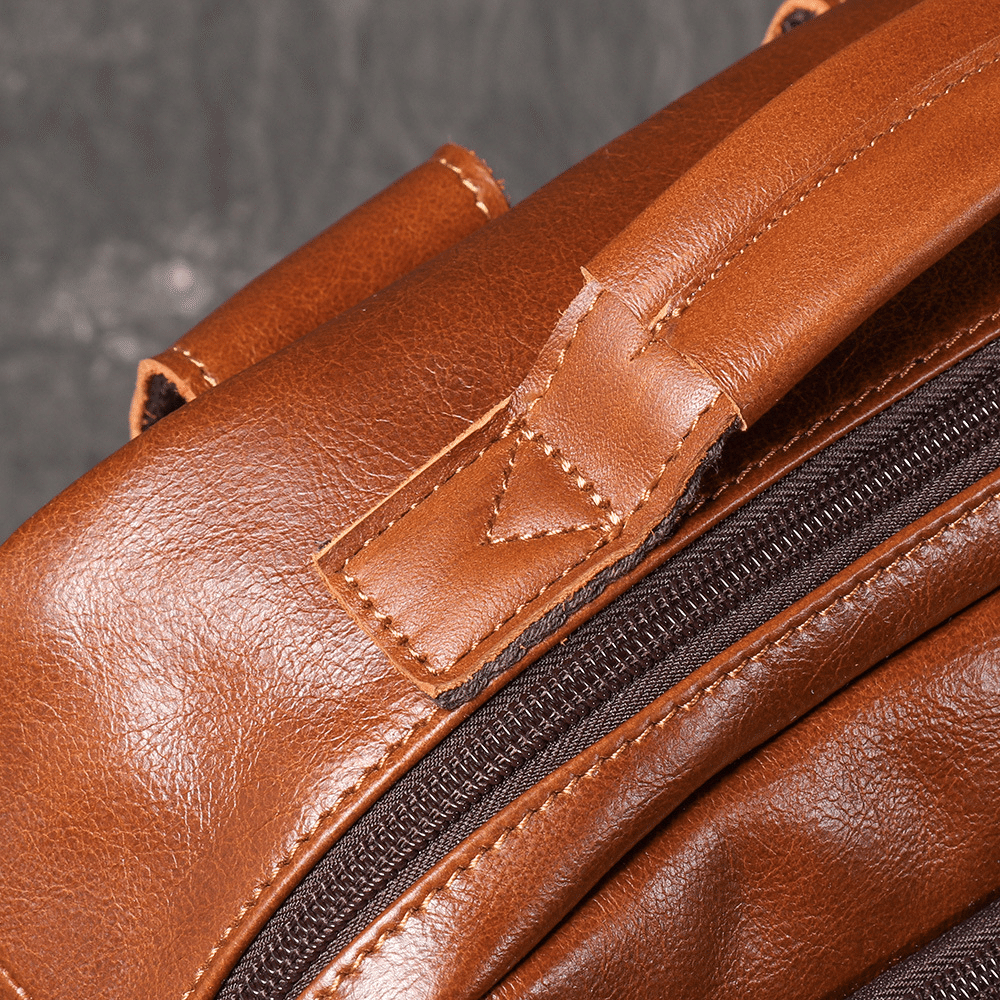 Brown men's laptop backpack, leather grain