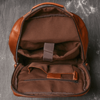 Brown men's laptop backpack, laptop sleeve detail