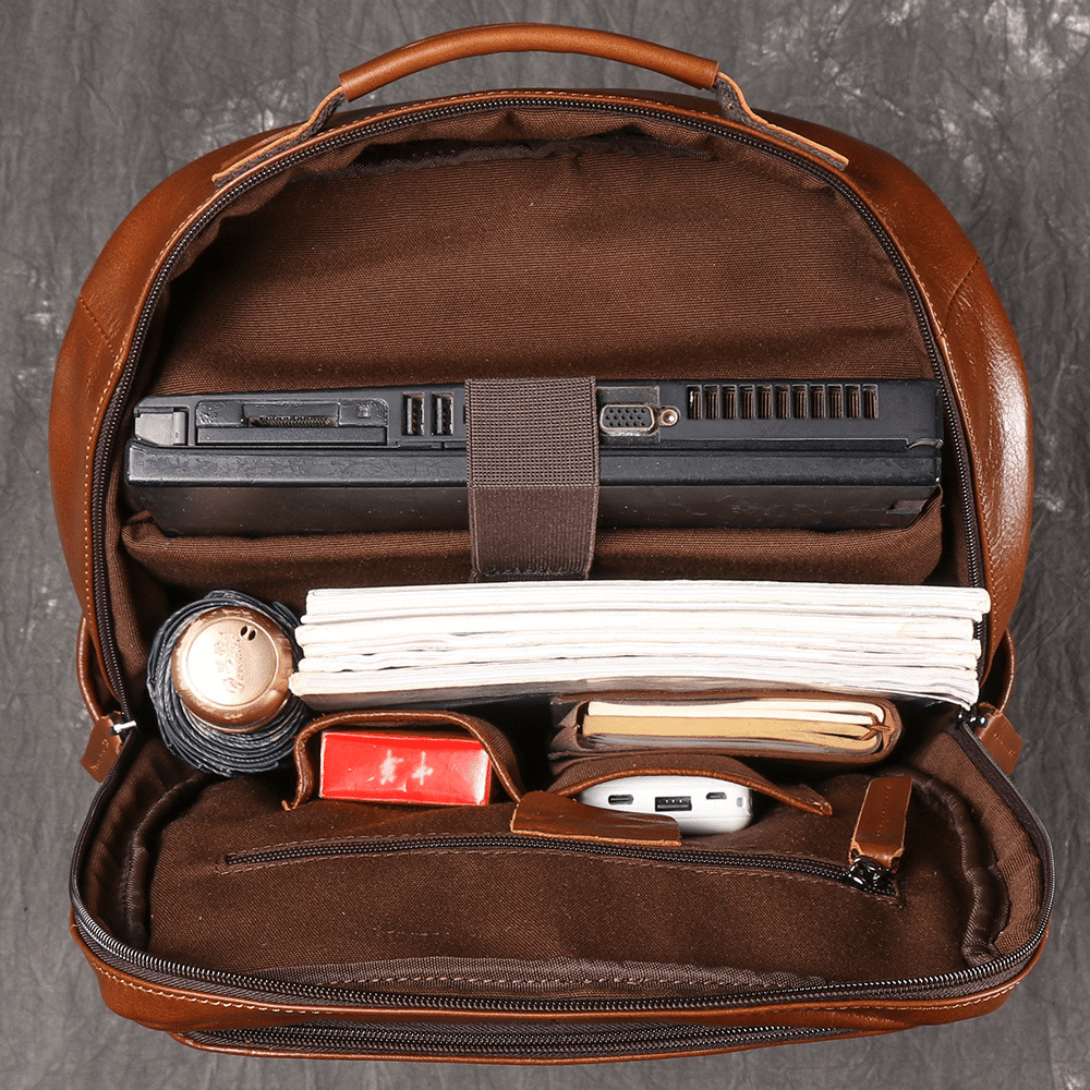 Brown men's laptop backpack, hardware detail