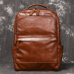 Brown men's laptop backpack, side pocket detail