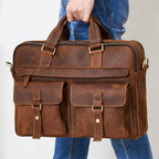 Brown men's laptop bag, handle detail