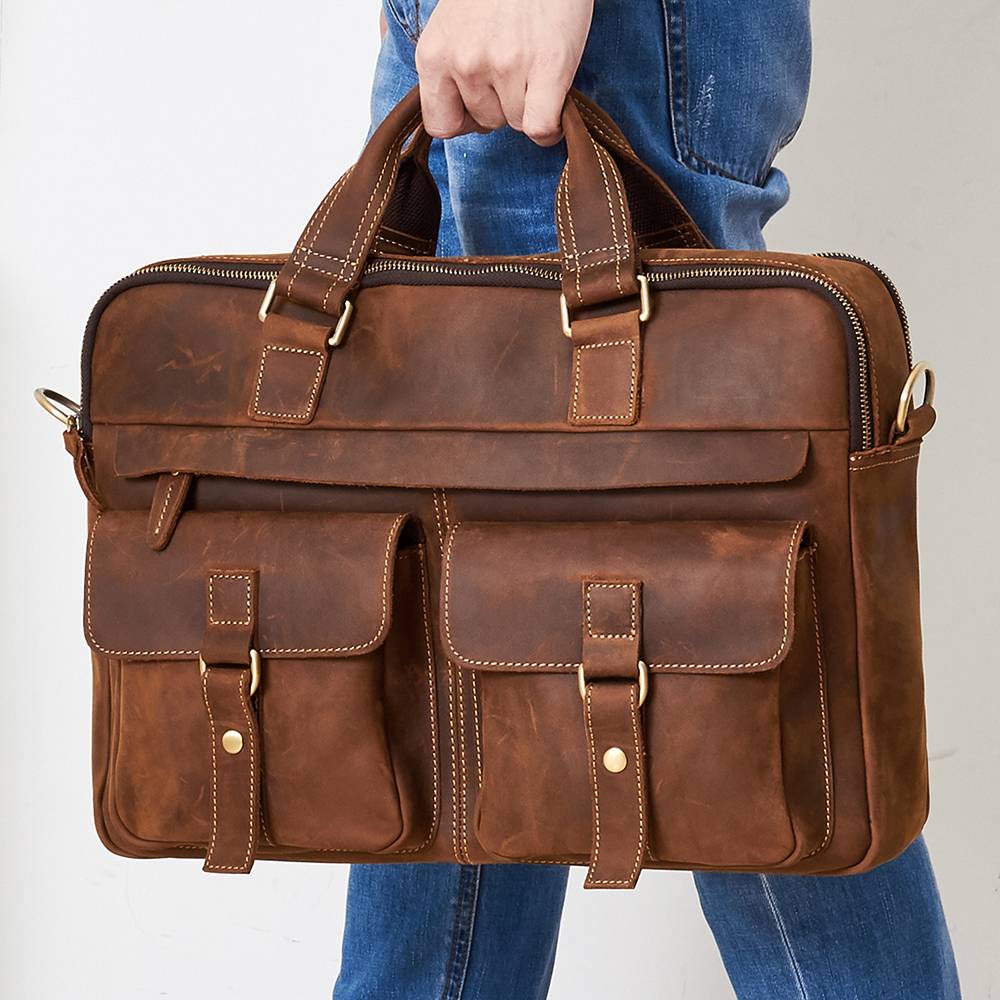 Brown men's laptop bag, handle detail
