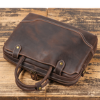 Dark brown men's laptop case, front pocket detail