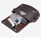 Dark brown men's messenger bag, interior packed with items