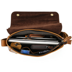 Brown men's messenger bag, interior packed with laptop and items