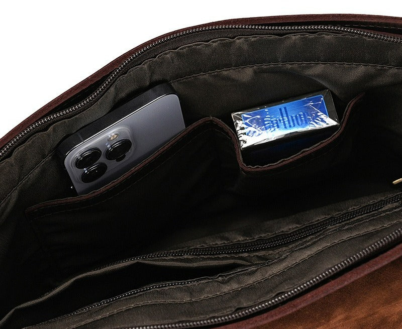Dark brown men's messenger bag, interior pockets with phone