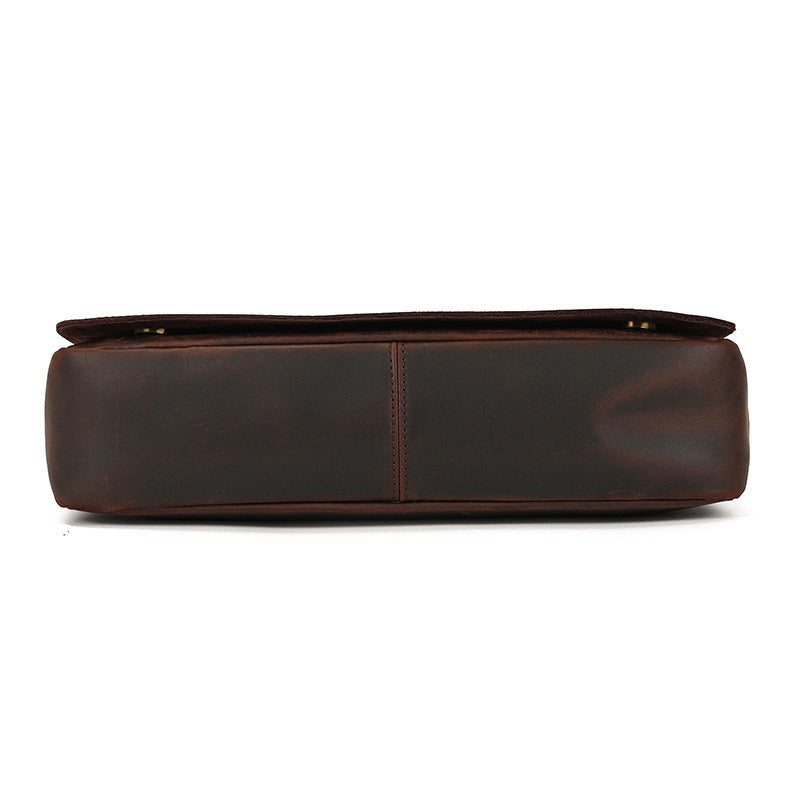 Dark brown men's messenger bag, bottom view