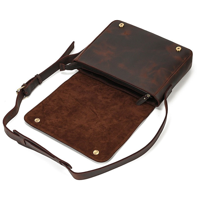 Dark brown men's messenger bag, flap open with strap