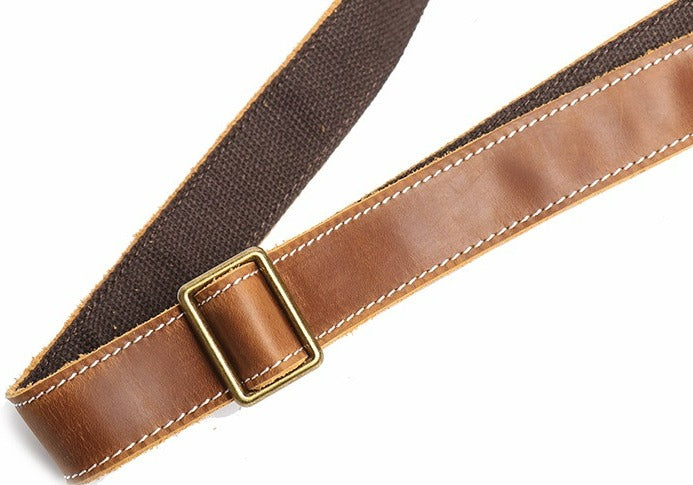 Brown men's messenger bag, strap detail