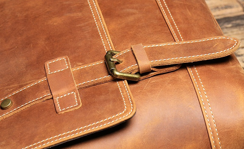 Brown men's messenger bag, side view