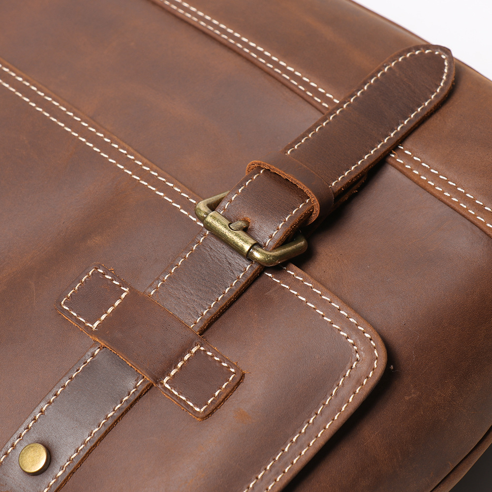 Dark brown men's messenger bag, side view