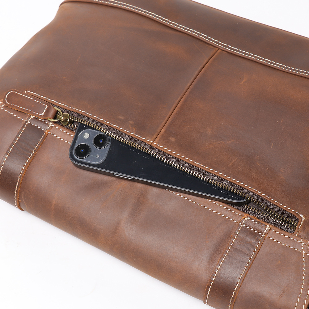 Dark brown men's messenger bag, back view