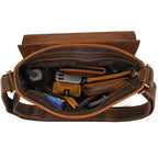 Dark brown men's messenger bag, interior packed with gear