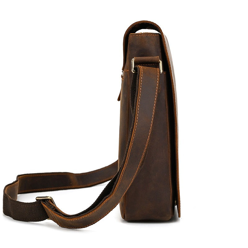 Dark brown men's messenger bag, side view