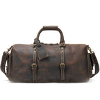 Brown-black men's overnight bag, flat lay