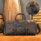 Brown-black men's overnight bag, bottom feet detail