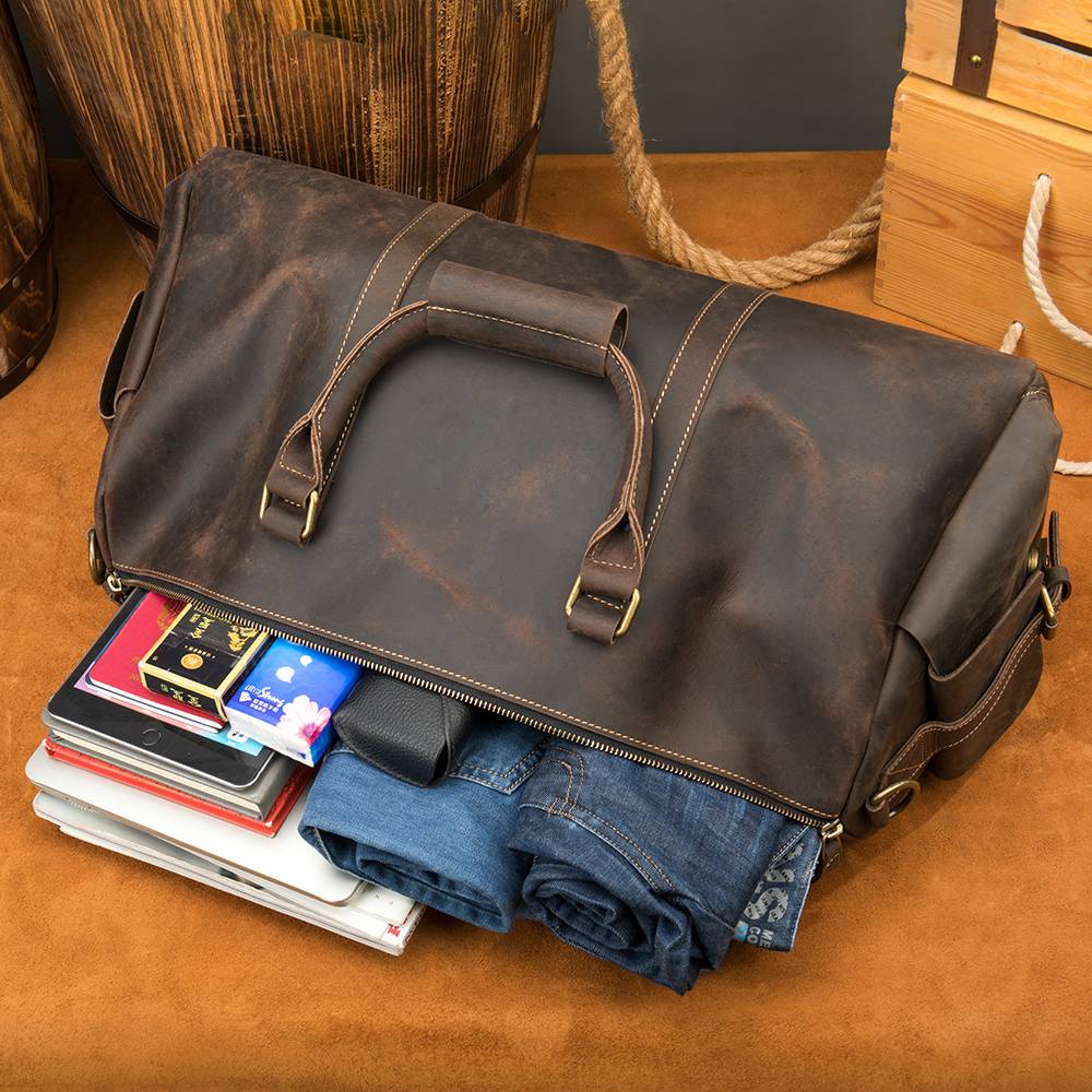 Brown-black men's overnight bag, top view