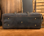 Brown-black men's overnight bag, side pocket detail