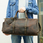 Brown-black men's overnight bag, hardware detail
