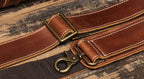 Brown men's oversized duffle bag, side view