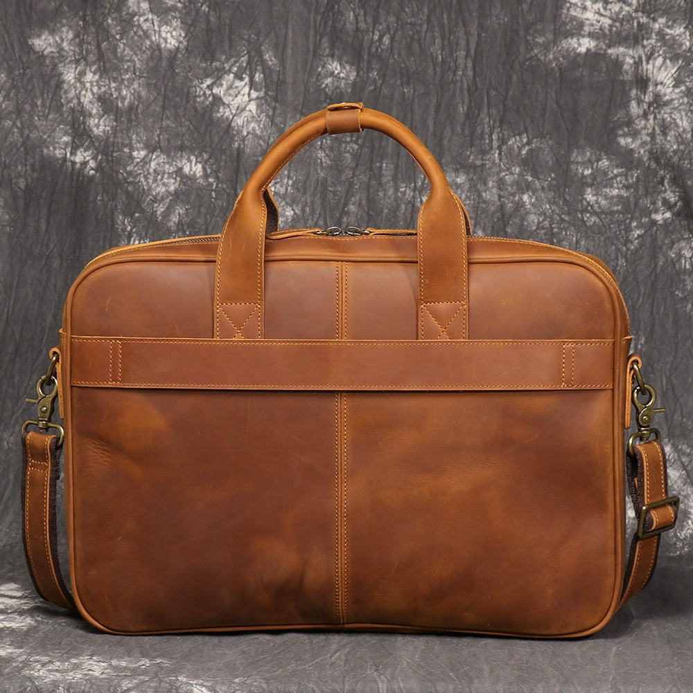 Brown men's satchel, buckle detail